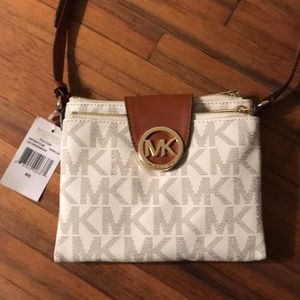 Never used Michael Kors crossbody in ‘vanilla’